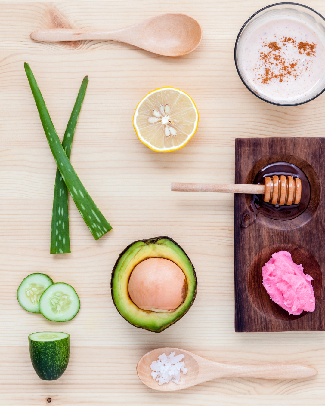 Hand holding a smartphone with various colorful app icons floating above it